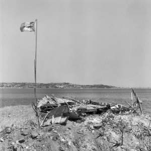 96_7_Flag-with-Destroyed-boats-CA